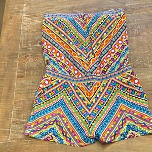 Trina Turk strapless romper with pockets and bra.  Size Medium